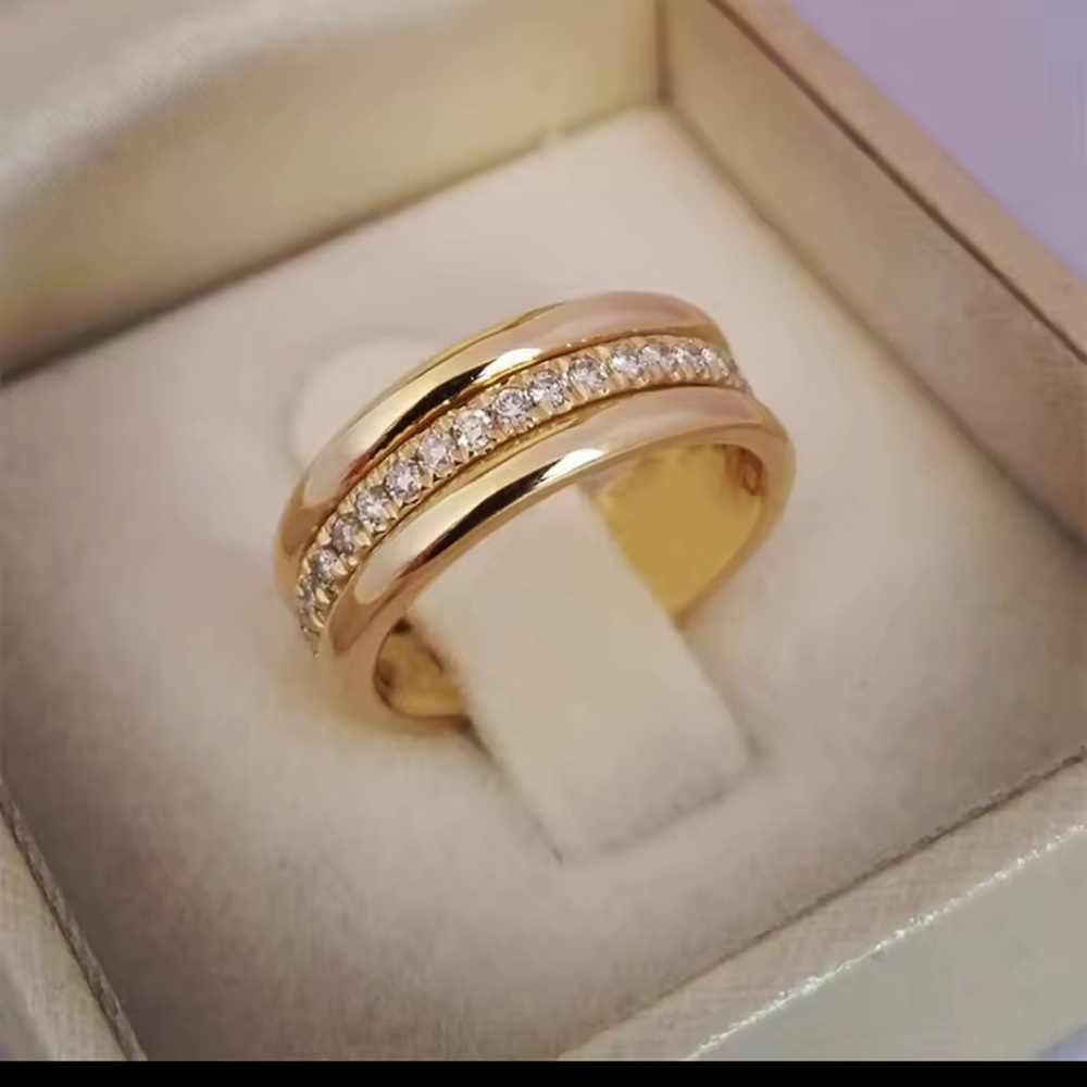 Elegant Gold Ring with Crystals